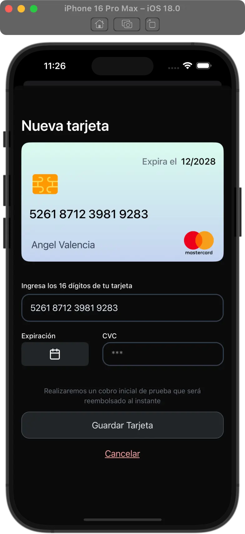 Screenshot of react native app with a credit card in dark mode